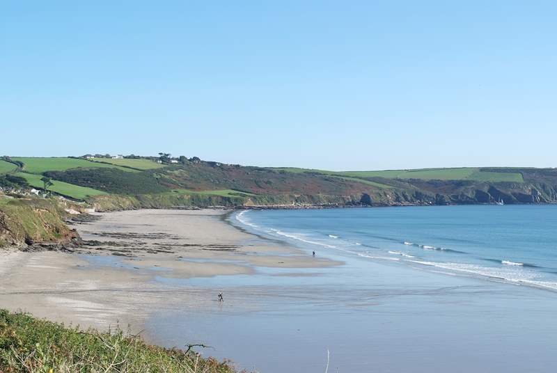 Pendower and Carne beaches join as the tide goes out giving miles of sand to enjoy.