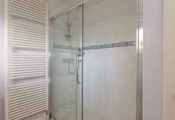 The shower-room on the ground floor has a double shower cubicle.