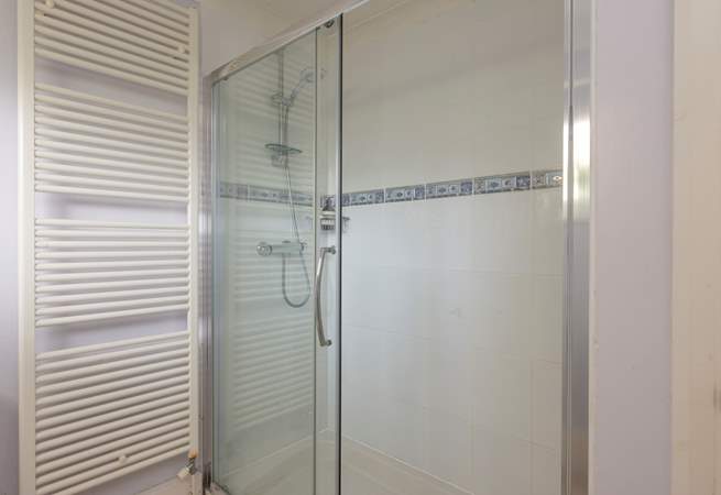 The shower-room on the ground floor has a double shower cubicle.