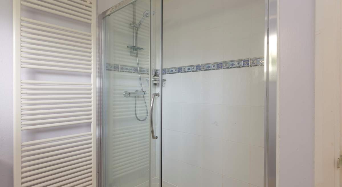 The shower-room on the ground floor has a double shower cubicle.