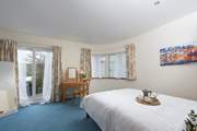 There are doors from Bedroom 1 out to the terrace.