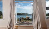 There are superb views across the river from the sitting-room, bedrooms and garden. - Thumbnail Image