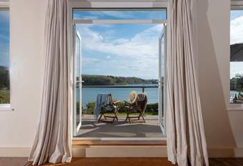 There are superb views across the river from the sitting-room, bedrooms and garden.