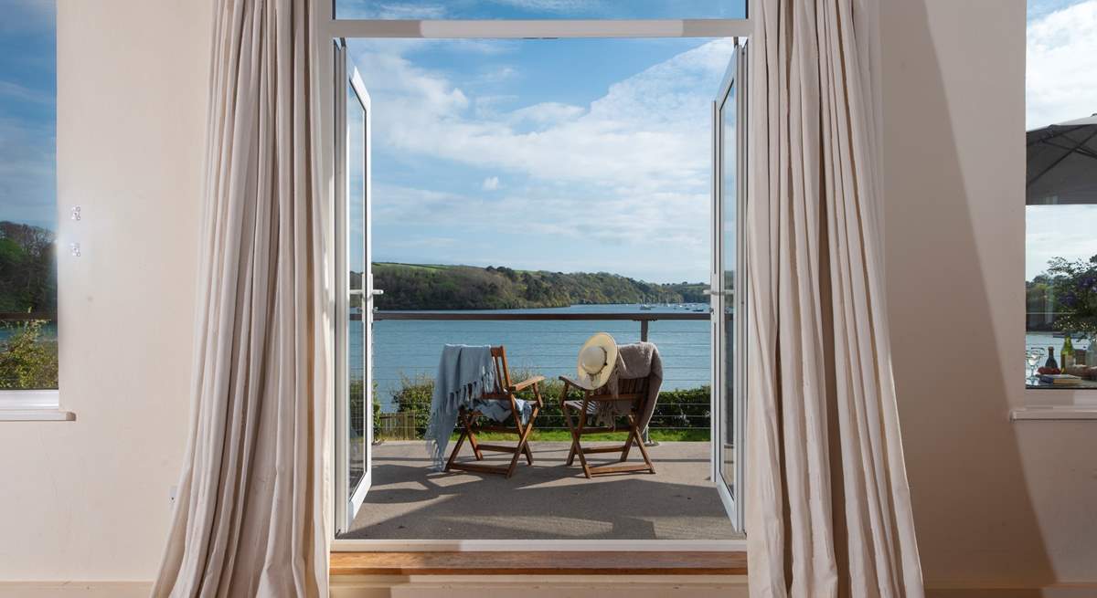 There are superb views across the river from the sitting-room, bedrooms and garden.