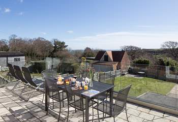 The fabulous terrace has far reaching views of the countryside, with the sea in the distance, on a clear day the Isle of Wight is visible.