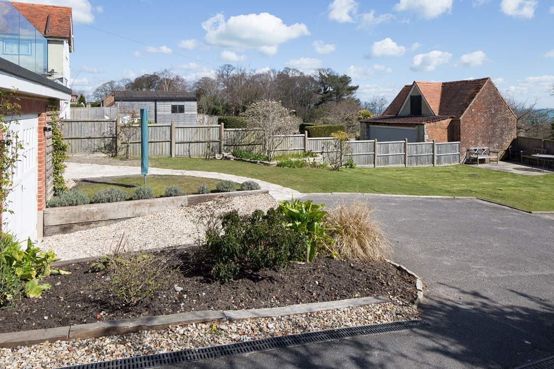 The peaceful back garden, with space for three cars.