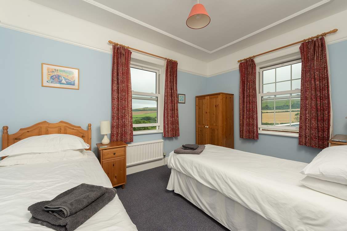 The twin bedroom has stunning countryside views.