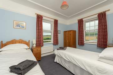 The twin bedroom has stunning countryside views.