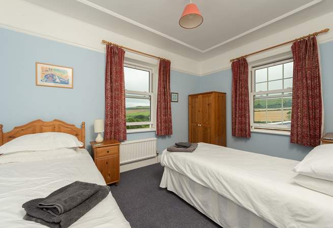The twin bedroom has stunning countryside views. 