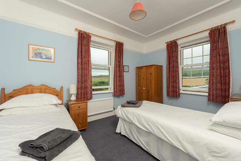 The twin bedroom has stunning countryside views. 