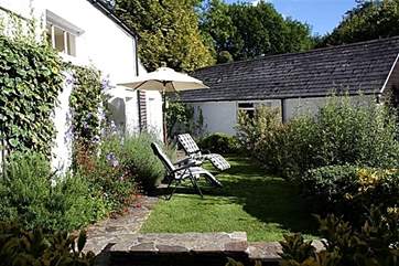 The garden in front of the cottage is a delight on a sunny day.