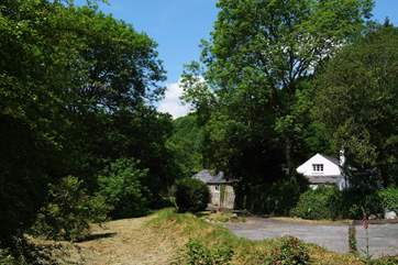 The drive up to the cottage (the gable end showing to the right with a barn in front).