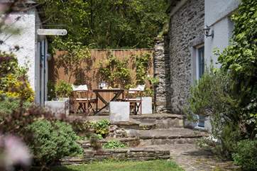 Perfect little sun-trap. Ideal for a spot of dining al fresco.