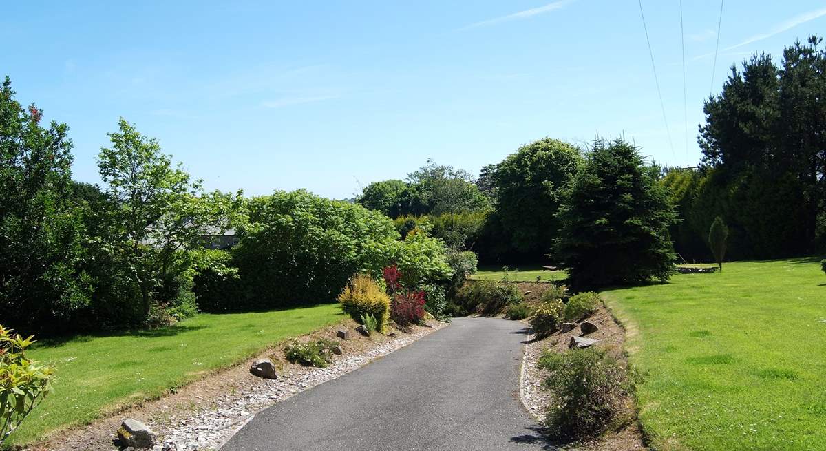 The private driveway through the garden.