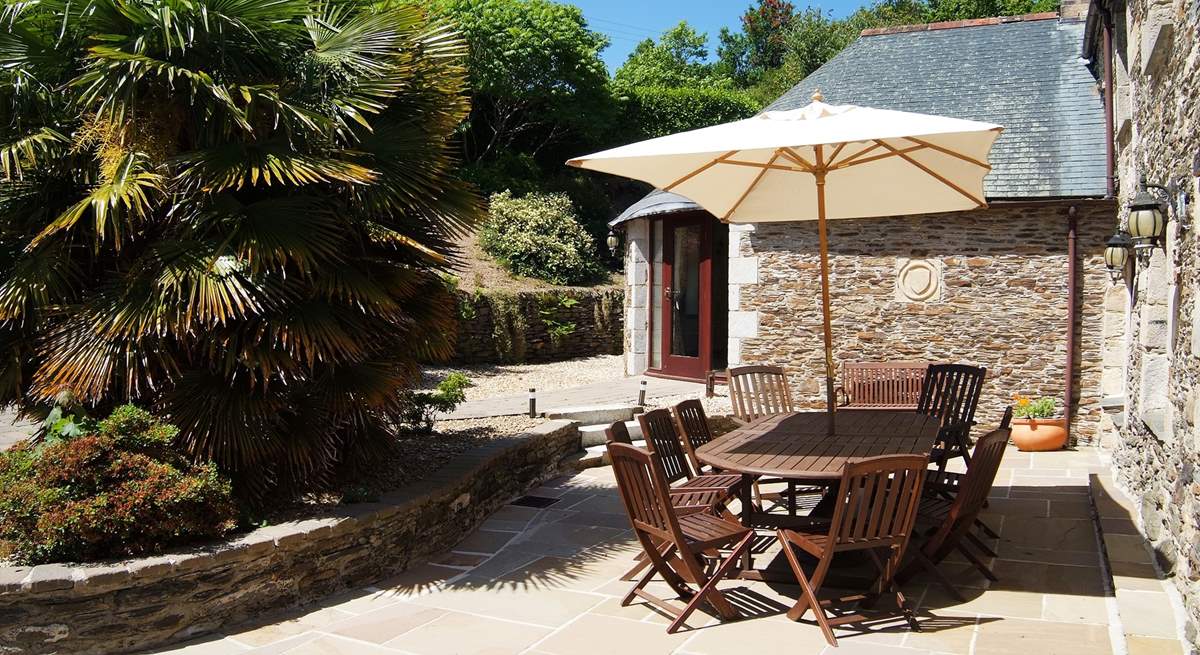 The sunny dining-area in the sheltered courtyard.