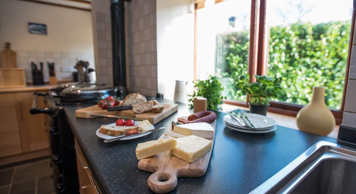 The work surface faces out over the courtyard to the rear.