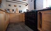 The lovely Alpha range is similar to an Aga (and also provides hot water and central heating). - Thumbnail Image