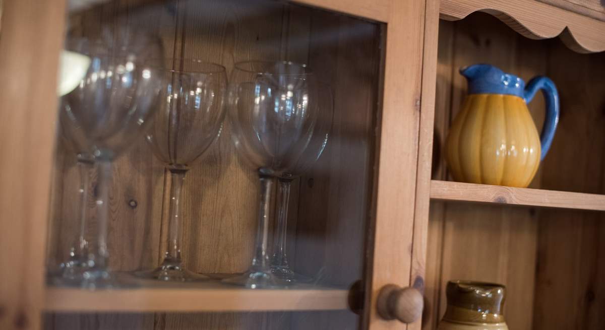 A pine dresser for glasses and other bits and bobs.