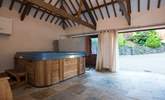 The garden-room houses the wonderful hot tub, and doors open out to a sheltered courtyard. - Thumbnail Image