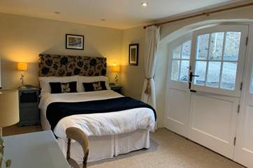 The en suite double bedroom on the ground floor (Bedroom 1).