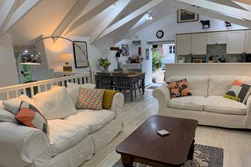 The spacious and comfortable open plan sitting-room.