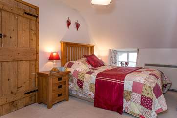 The cottage-style double bedroom.