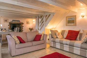 For a traditional cottage, the open plan sitting and dining-room is very spacious.