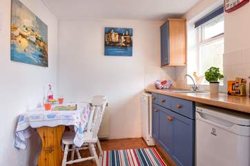 There is an additional table in the kitchen.