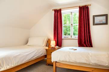 This bedroom overlooks the drive for the barn.