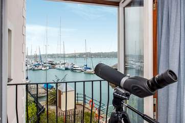 There are fabulous views across the moorings and harbour from the first floor sitting-room