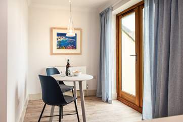 There is a little breakfast-table too overlooking another small balcony.
