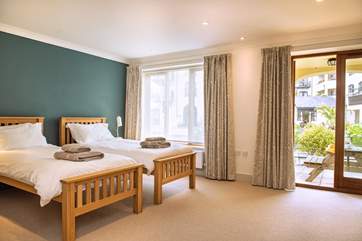The twin bedroom on the ground floor overlooks the marina (Bedroom 1).