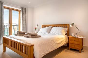 This bedroom has a king-size bed and a Juliet balcony (Bedroom 3).
