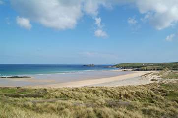 The north coast is a short drive away, and there you will find the glorious long sandy beach at Gwithian.