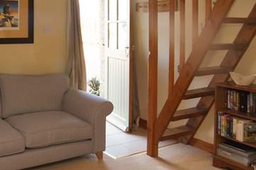 Very steep ladder stairs lead up to the spacious bedroom. A cosy super-king size bed awaits.
