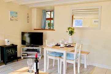 Whether you want to relax reading a book or watching a movie after a meal, the living-room is perfectly equipped.