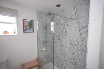 The walk-in waterfall shower in the bathroom, the perfect wake up in the morning.