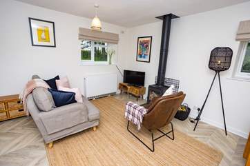 Get cosy and enjoy some time together in the living area.