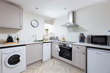 Walk into the well-equipped kitchen, perfect for cooking up your favourite holiday meal.