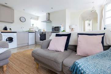 The kitchen and living area are open plan, making for a very social holiday.