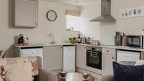 Walk into the well-equipped kitchen, perfect for cooking up your favourite holiday meal.