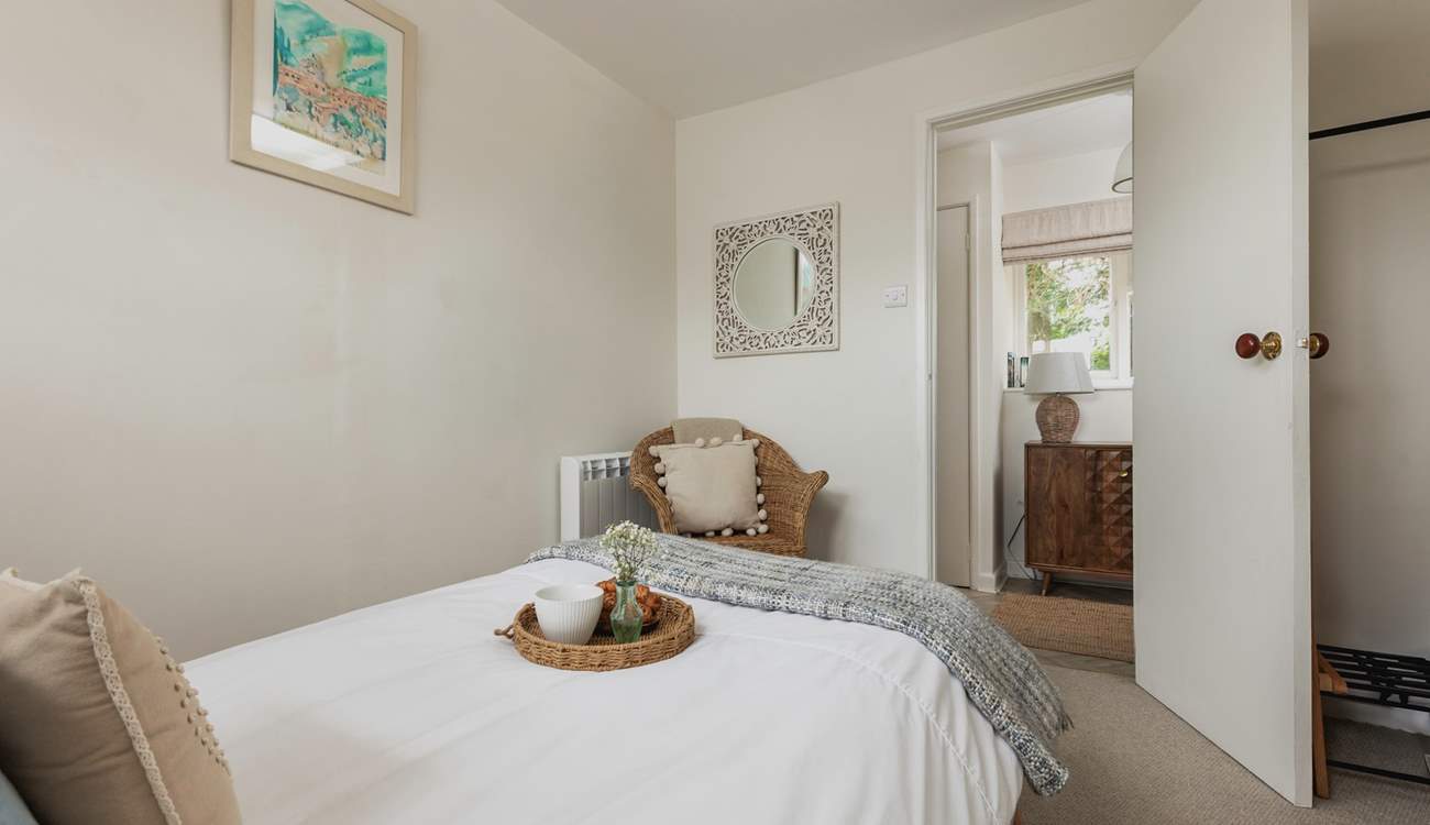 Sitting off the hallway, the perfect bedroom awaits. 