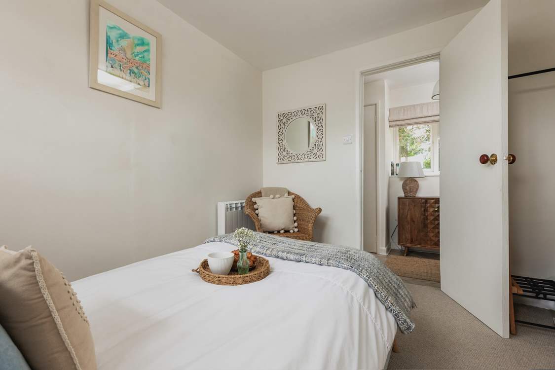 Sitting off of the hallway the perfect bedroom awaits.