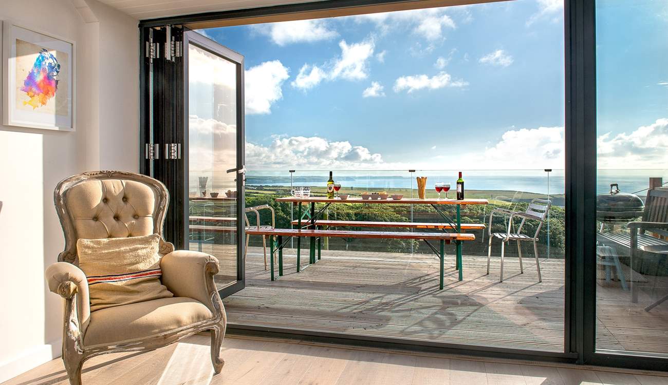 The large picture window which leads out to the decking area, takes full advantage of the spectacular view.