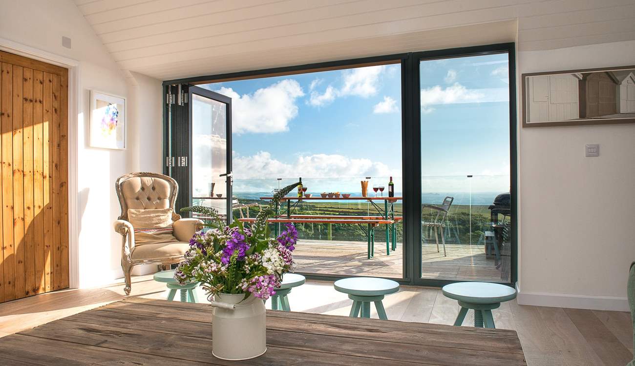 The bi-fold doors provide easy access to the balcony.