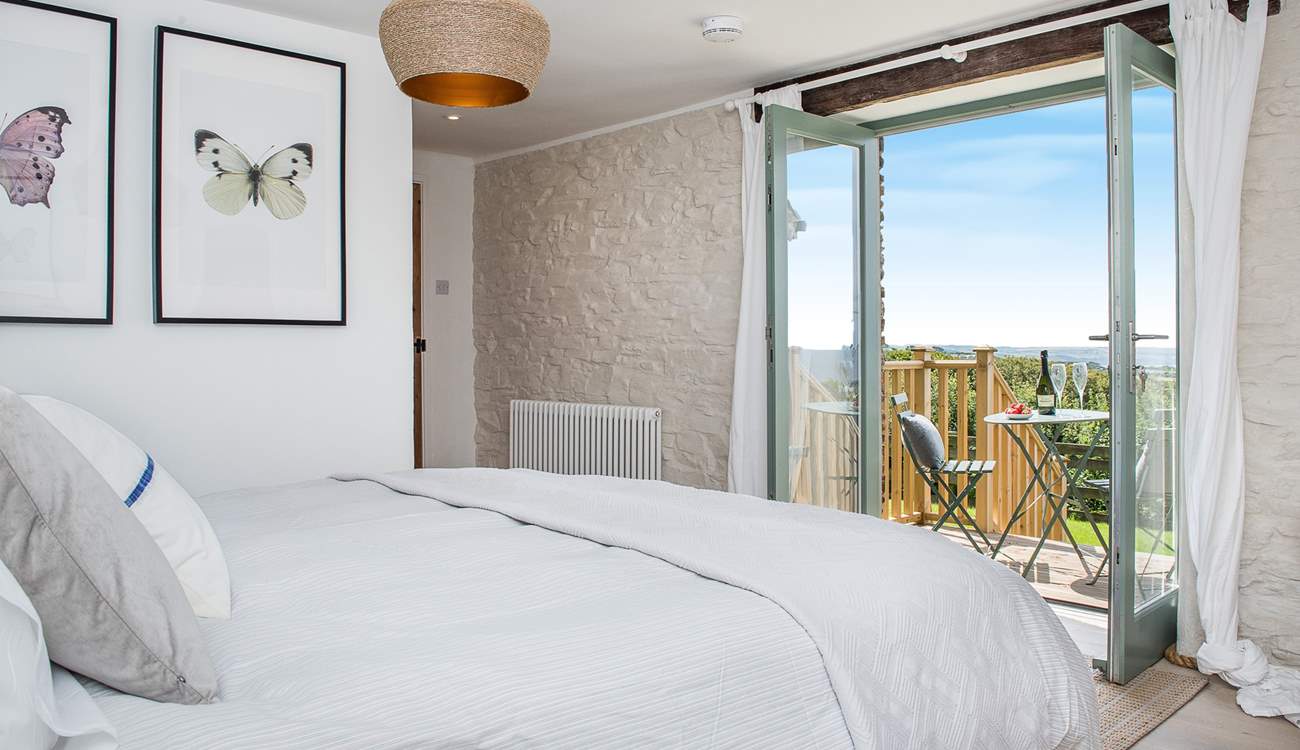 Patio doors from Bedroom 5 lead out to the garden.