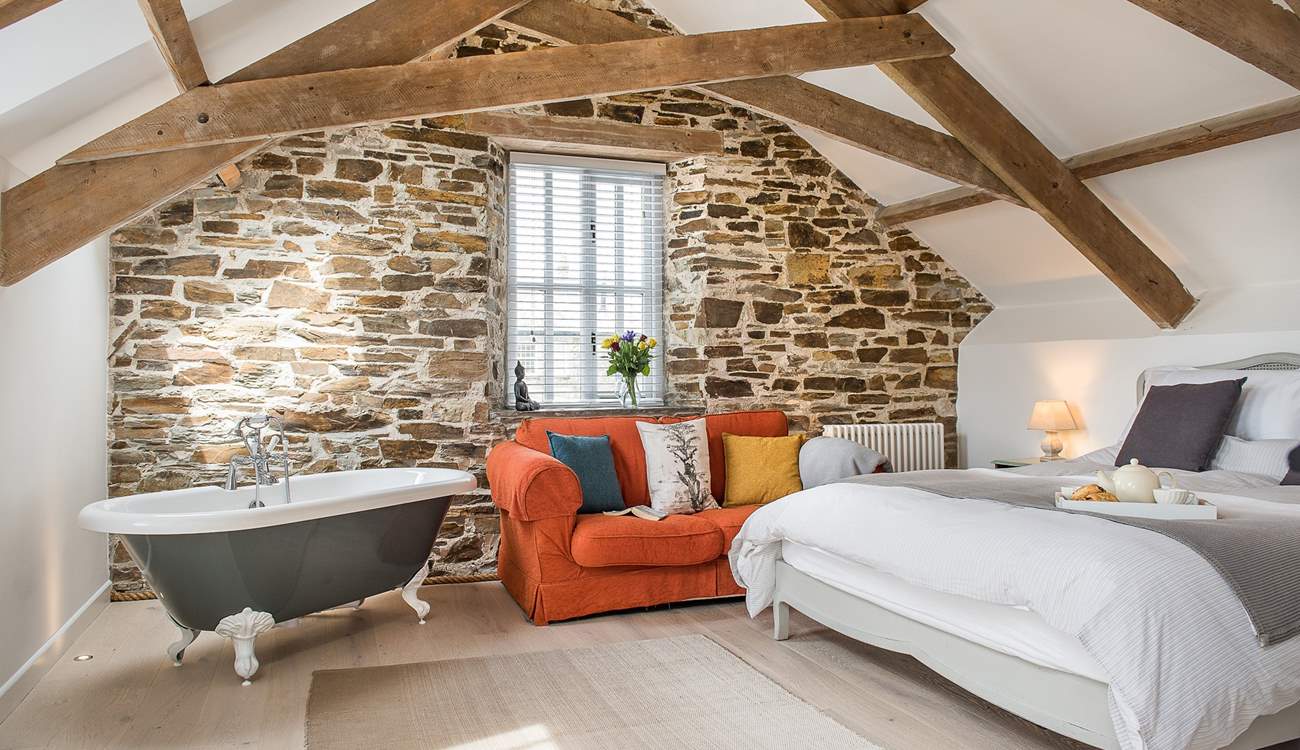 Bedroom 1 on the first floor - is beautifully furnished and even has a roll-top bath.