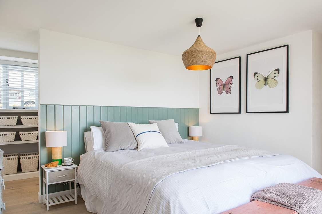Bedroom 5 has a lovely king-size bed.