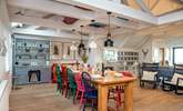 Holiday mealtimes will be a delight with everyone gathered around the large dining table. - Thumbnail Image