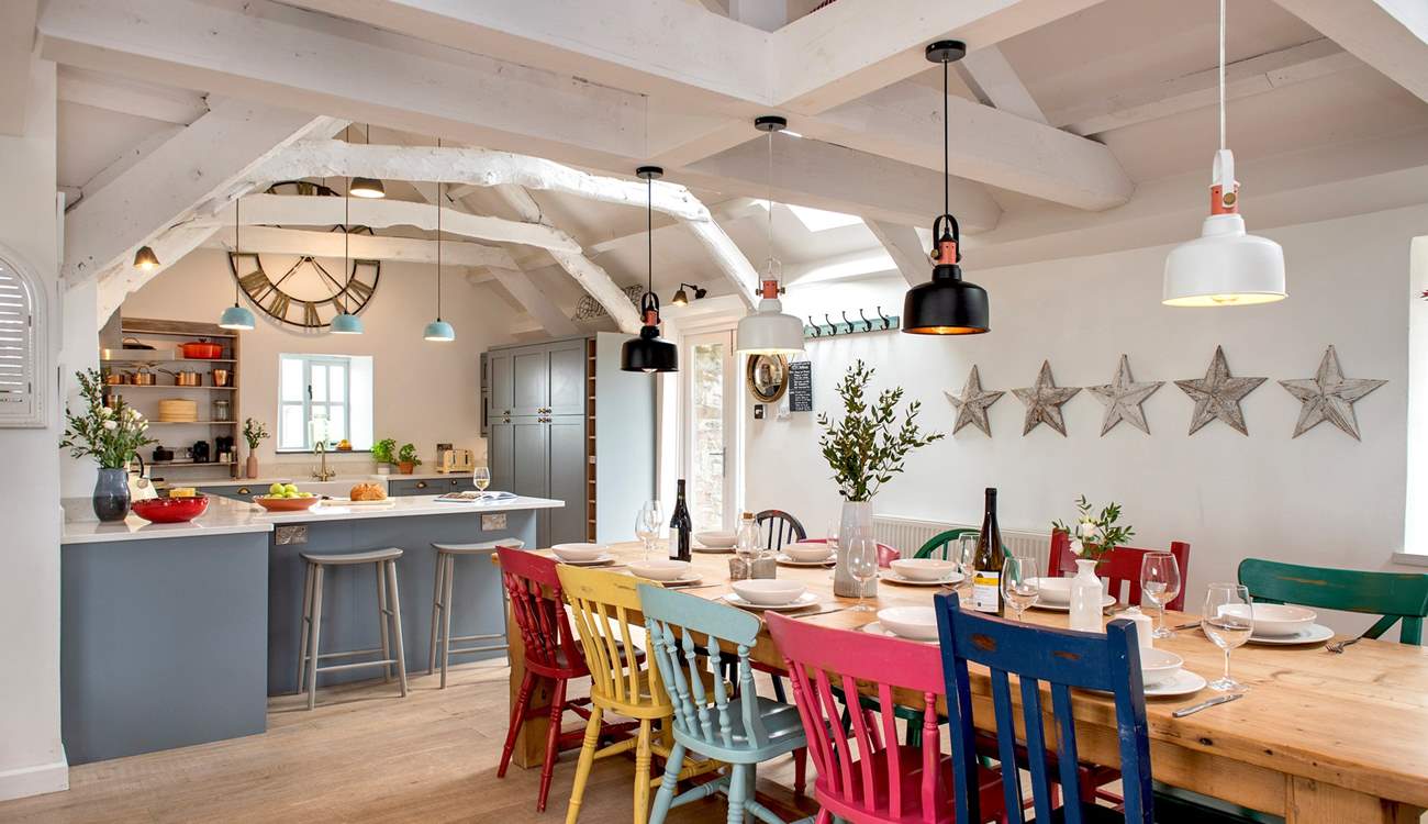 The dining-table sits next to the kitchen-area, which makes it really easy when serving up.